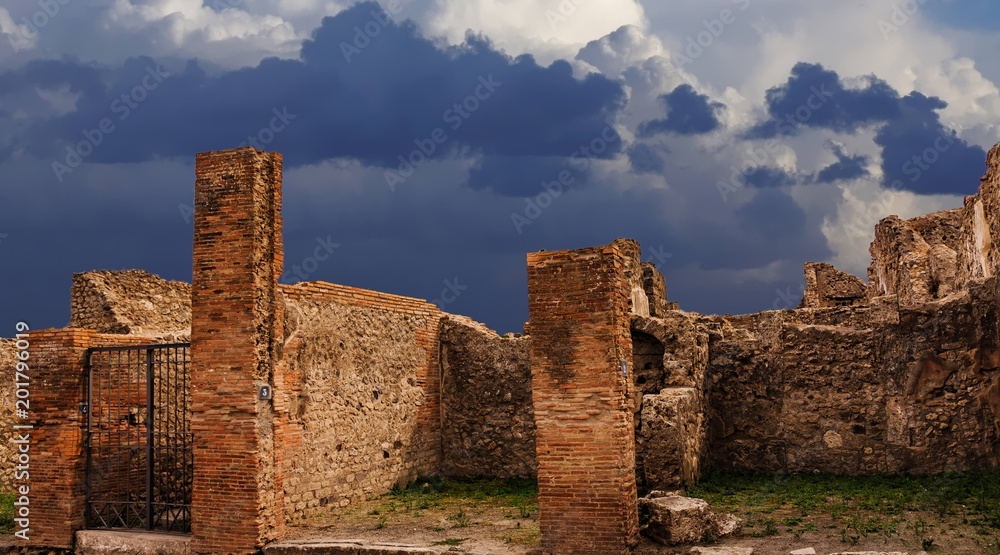 Ancient Homes in Pompeii Under Stormy Clouds