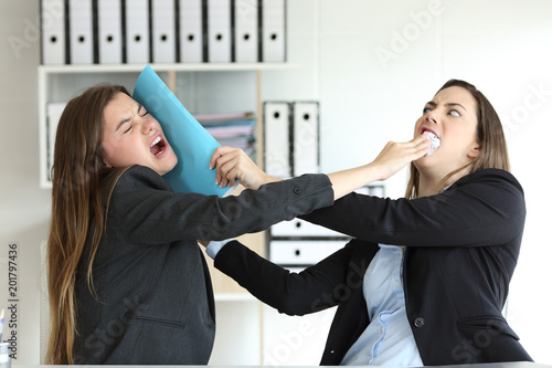 фотографія Two angry executives fighting at office