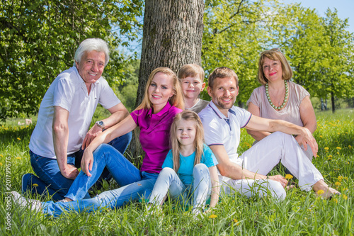 Multigeneration family in park © yellowj