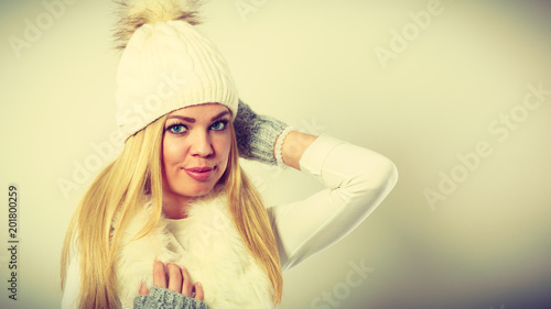 Attractive woman wearing winter clothes.