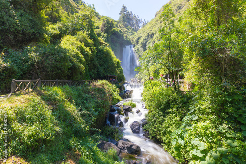 Ecuador Otavalo waterfall of the Peguche in a sunny day photo