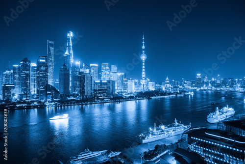 shanghai skyline at night with blue tone