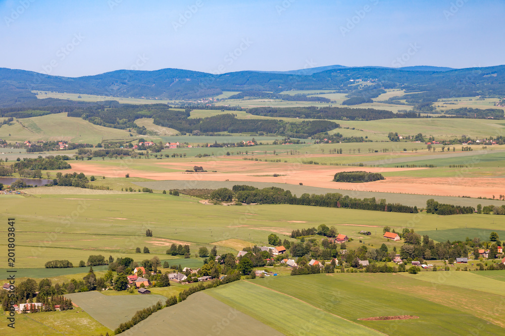 Aerial view of farmland and villages in the Czech countryside of northern Bohemia