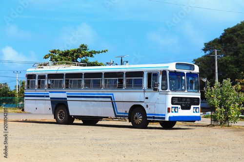 white blue old vintage bus on the road