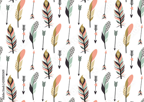 Tribal feathers and arrows seamless pattern.