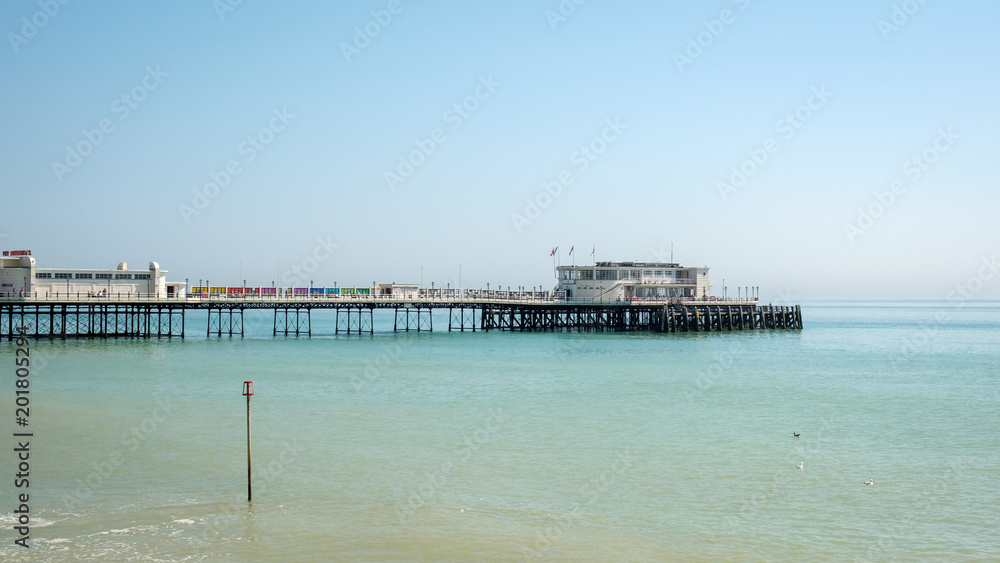 WORTHING, WEST SUSSEX/UK - APRIL 20 : View of Worthing Pier in West Sussex on April 20, 2018. Unidentified people