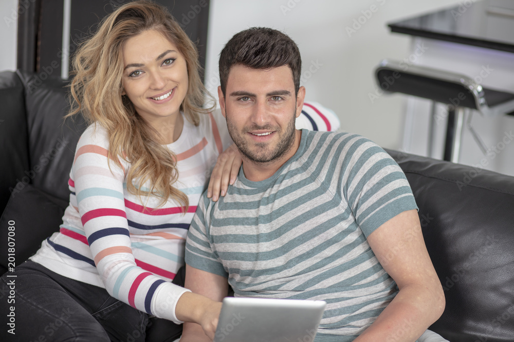 Young family couple together at home casual Young family couple together at home casual