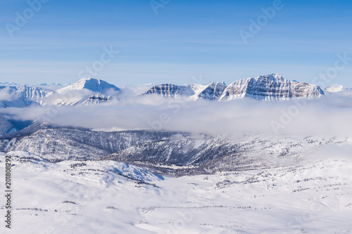 An aerial view of the Rocky Mountains in Alberta, Canada in winter