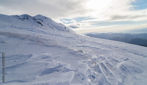 Bright winter scenery in the Alps with fresh snow © Calin Tatu