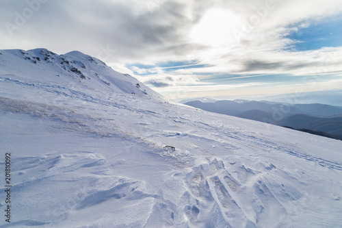 Bright winter scenery in the Alps with fresh snow © Calin Tatu