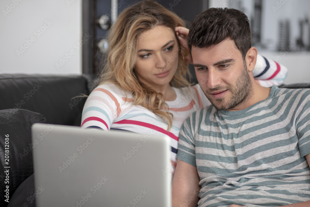 Joyful husband and wife relaxing at home Joyful husband and wife relaxing at home