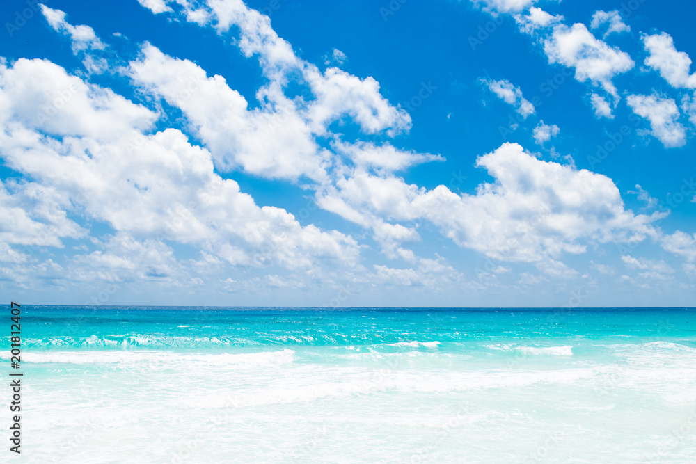 Beautiful tropical beach and sea with blue sky background Beautiful tropical beach and sea with blue sky background