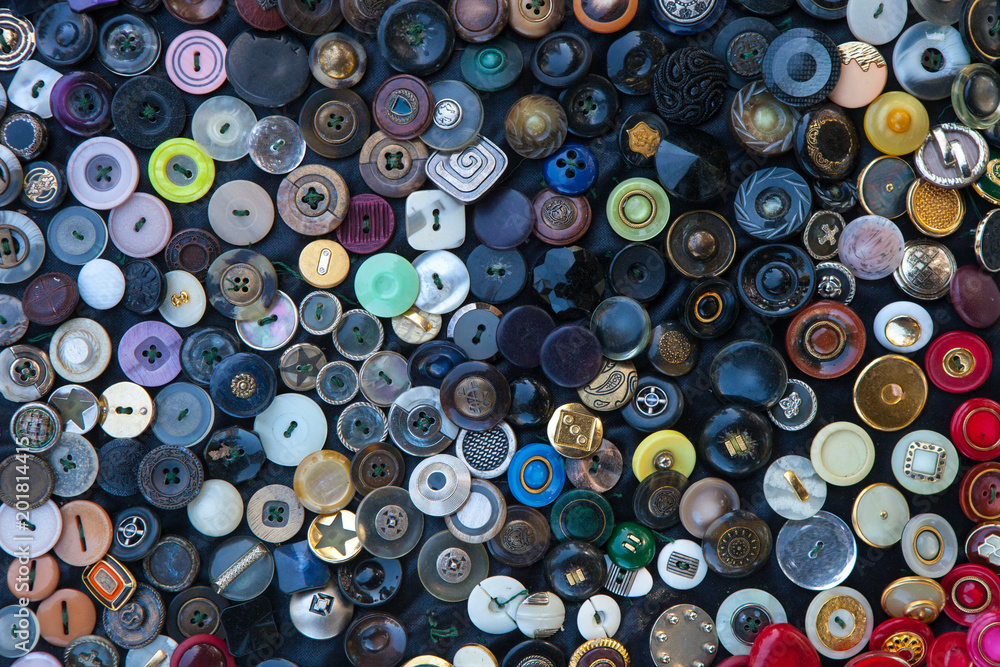Textured background of buttons of different color and size Textured background of buttons of different color and size