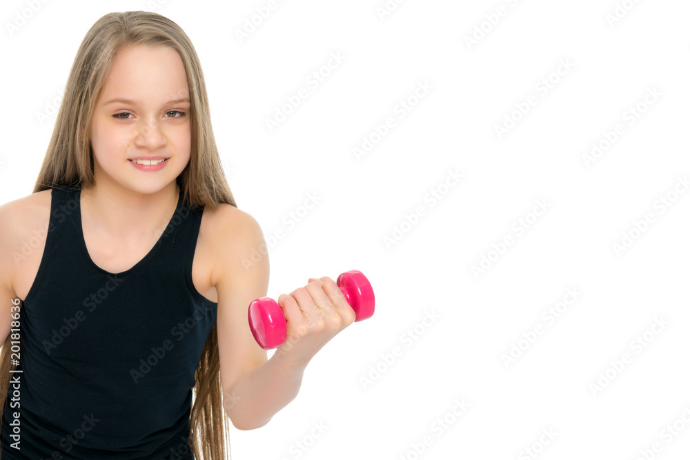 Teenage girl with dumbbells in hands Teenage girl with dumbbells in hands