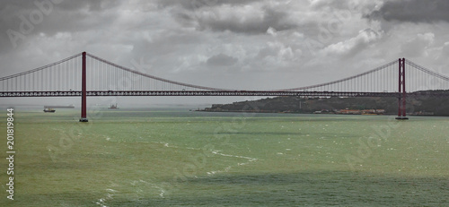 Long shot of 25 de Abril Bridge in Lisbon