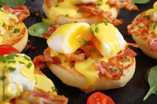 Obraz na plátně Eggs Benedict on a plate, close-up