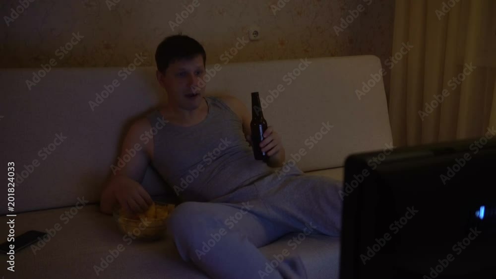 excited soccer fan watching game excited soccer fan watching game