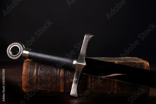 Canvas Print book and sword