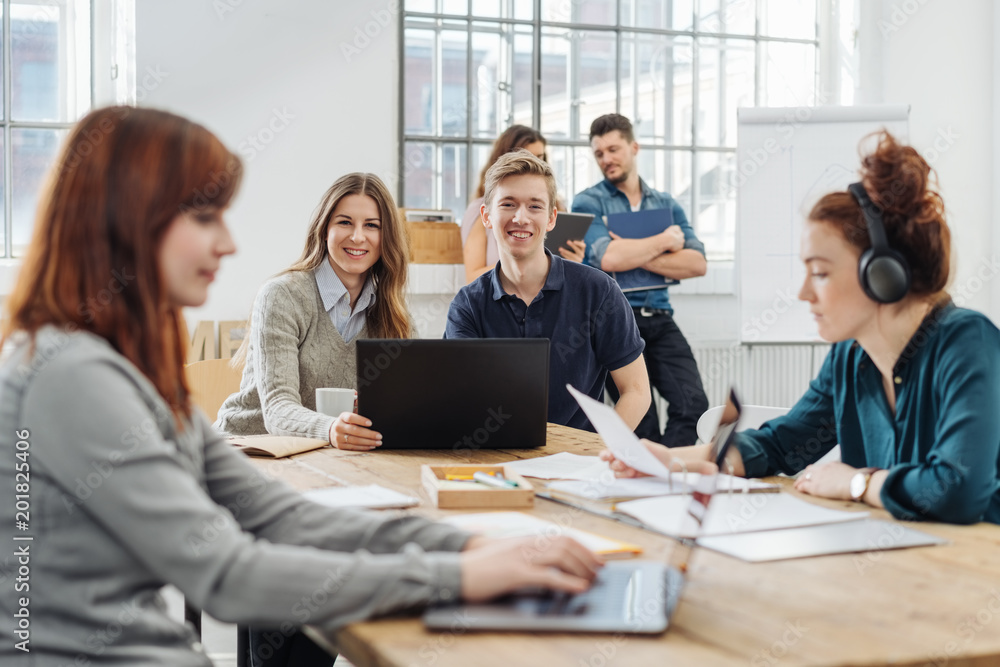 Young businessman and woman working as a team Young businessman and woman working as a team