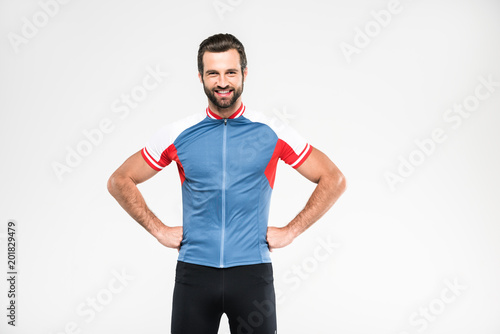 cheerful cyclist in sportswear, isolated on white