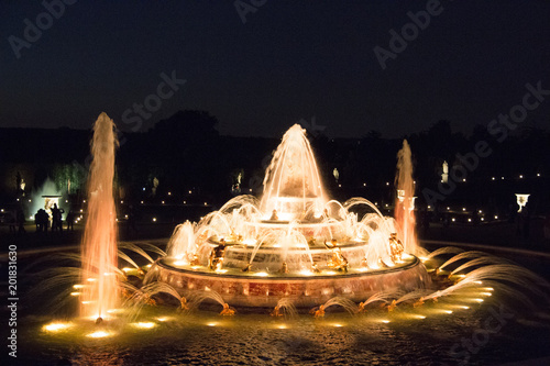 fountain of versailles palace in paris at night
