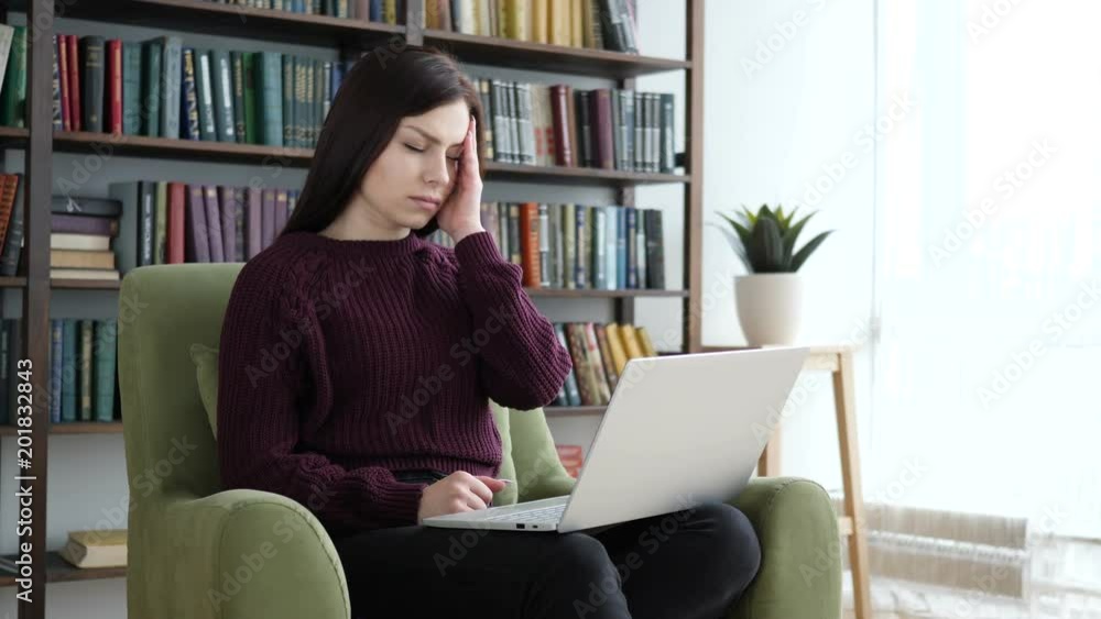 Pensive Woman Thinking and Working in Office Pensive Woman Thinking and Working in Office