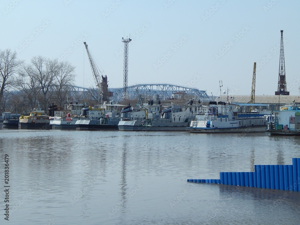 Ships of the river fleet. Ships in the backwater. River vessels in the dock. Technical boats moored at the shore. Ships of the river fleet. Ships in the backwater. River vessels in the dock. Technical boats moored at the shore.