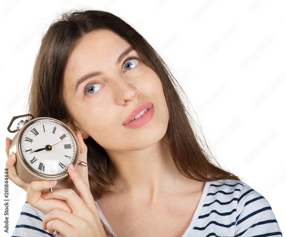 Young woman with alarm clock isolated on white. Time management concept Young woman with alarm clock isolated on white. Time management concept