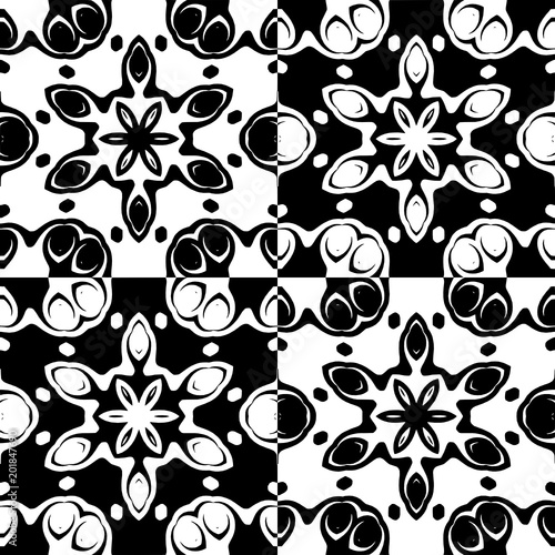 Decorative geometric pattern with ornamental flowers in a black and white colors