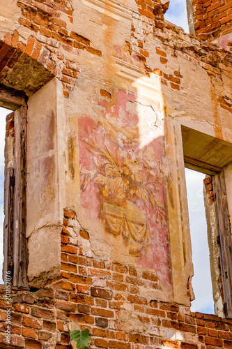 Frescoes on the walls of an old abandoned manor house of the 18th century, a view from the inside. Belkino Manor, Russia