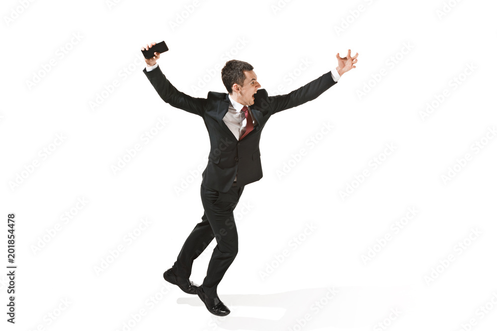 Screaming businessman over white background