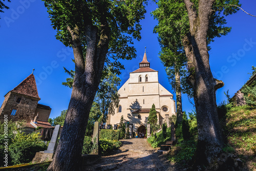 Ropemakers Tower and Church on the Hill in Sighisoara town in Romania photo