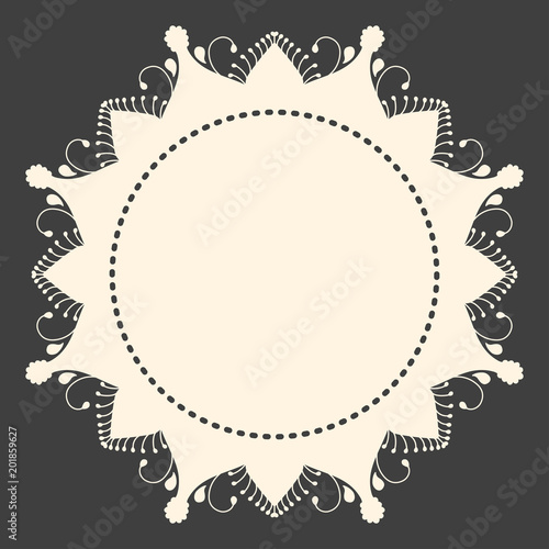 Beige round ornament copyspace frame on dark grey background