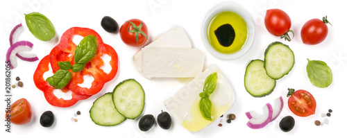 Healthy eating concept - selection of greek salad ingredients on white background