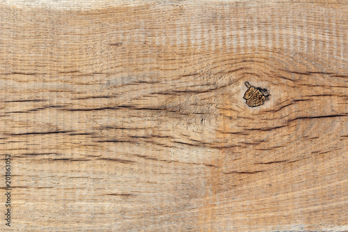 Texture of an old weathered wooden board closeup. Natural wood background