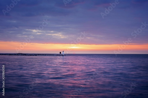 Sunset lighthouse sea sky clouds beach landscape spring sun © Sinisa