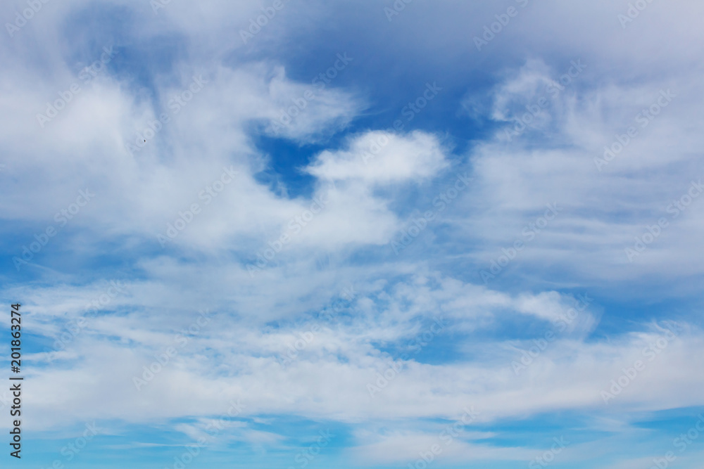 Beautiful background of blue sky with white clouds