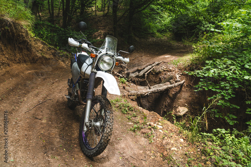 travel motorcycle off road, forest dirt, concept, active lifestyle, enduro