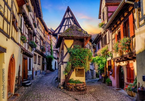 Fototapeta Naklejka Na Ścianę i Meble -  Colorful half-timbered houses in Eguisheim, Alsace, France