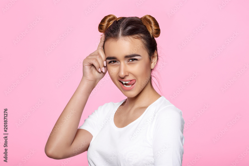 young woman on pink background Attractive beautiful woman showing air kiss young woman on pink background Attractive beautiful woman showing air kiss