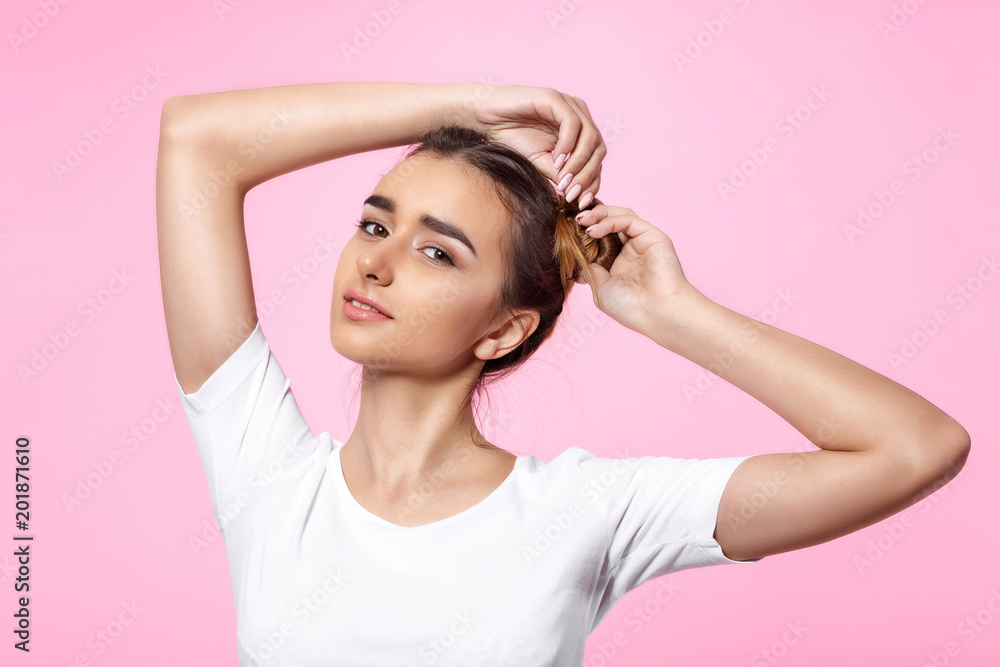 young woman on pink background Attractive beautiful woman showing air kiss young woman on pink background Attractive beautiful woman showing air kiss