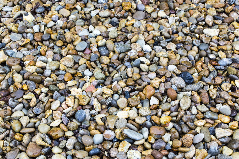 Wet pebbles at a river basin