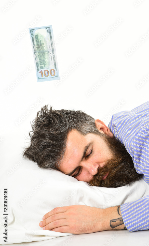 Obraz premium Man, businessman sleeps with banknote above head, white background.