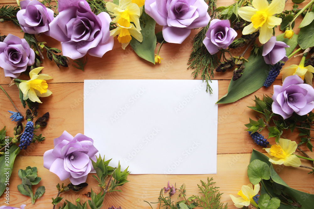 Top view with lilac roses, daffodils