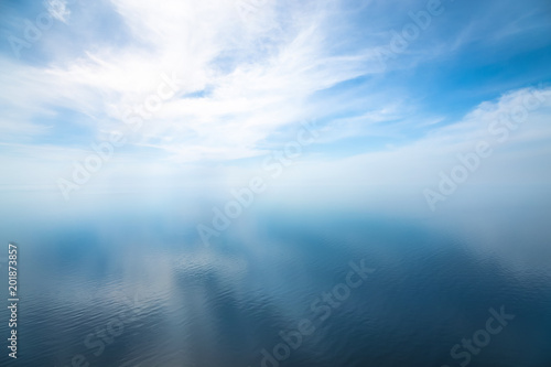 Beautiful seascape in the Atlantic ocean. Seascape with cloudy sky and light shadows on the water