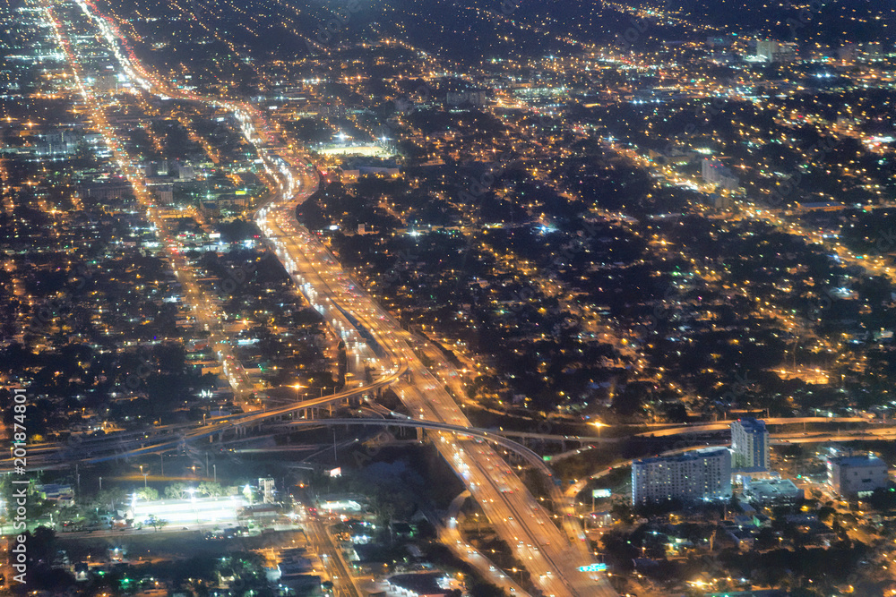 Fototapeta premium City lights from airplane at night