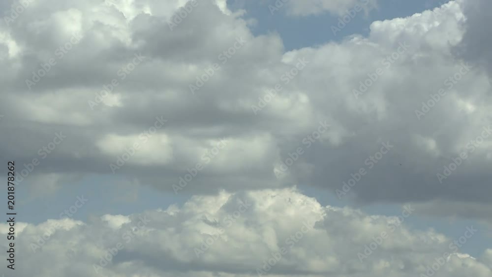 Timelapse of white clouds with blue sky in background. Timelapse of white clouds with blue sky in background.
