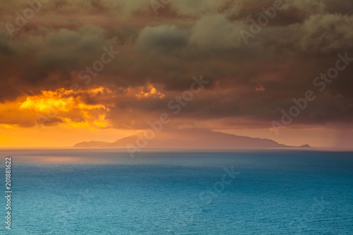 Power of nature dramatic orange sky above ischia island