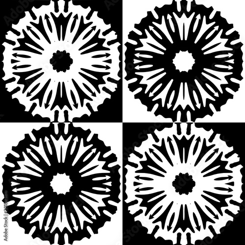 Openwork pattern with four decorative flowers in a black and white  comtrast colors