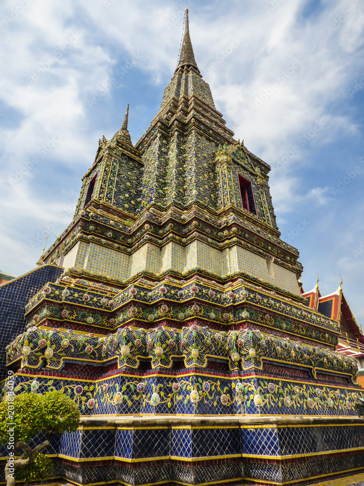 Large colorful stupa in the Phra Maha Chedi Si Ratchakan area of Wat Pho (Buddhist temple) in Bangkok, Thailand